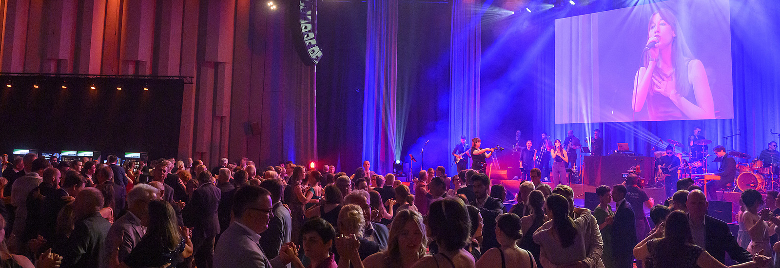 A ballroom full of people celebrating