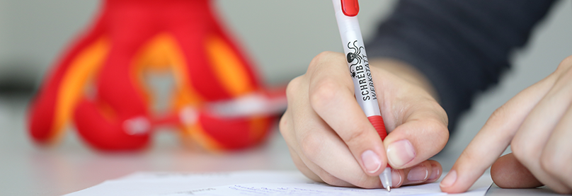 Hand mit Stift