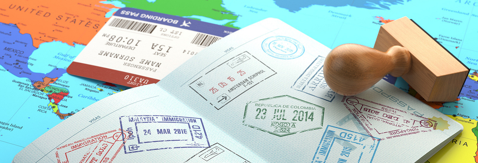 A passport with many stamps on two pages. It lies on a world map and a flight ticket.