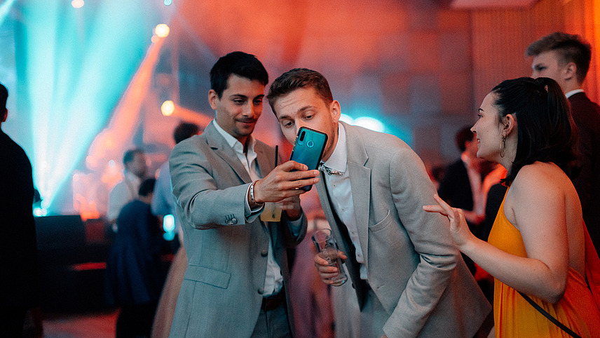 Two people take a selfie