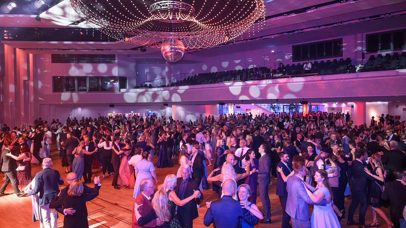 Festively dressed people at an event