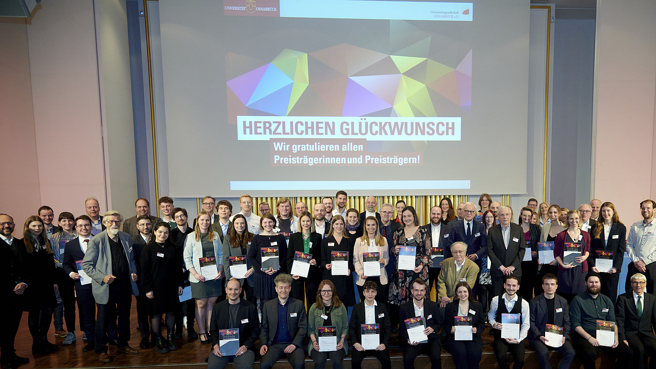 A group photo of all those involved in the award ceremony.